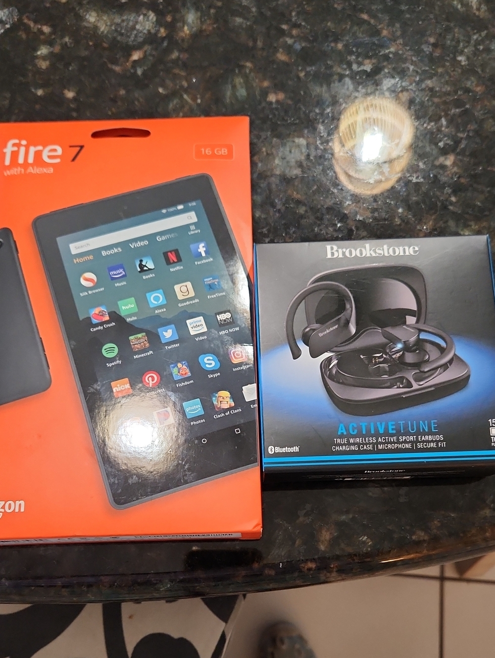 BOTH Fire 7 And Brookstone Earbuds Both Unopened